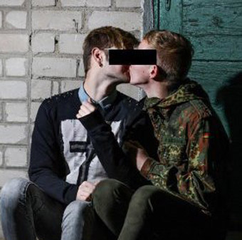 Gay students who posted kiss pic on Facebook told by court they were 'asking' for death threats
